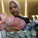 Rupiah Melemah ke Rp16.780 per Dolar AS, Pasar Tunggu Data Ekonomi