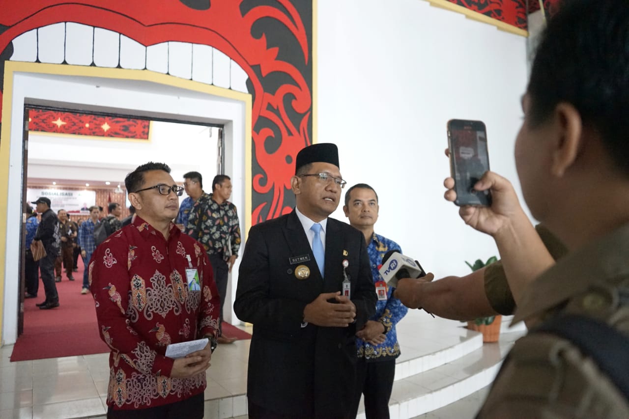 Sosialisasi Kebijakan Pengelolaan Keuangan Desa dan Launching Jamsostek Bagi Pekerja Rentan dan Ketua RT/RW