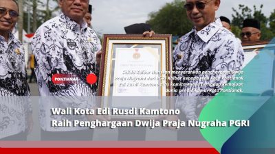 Wali Kota Edi Rusdi Kamtono Raih Penghargaan Dwija Praja Nugraha PGRI